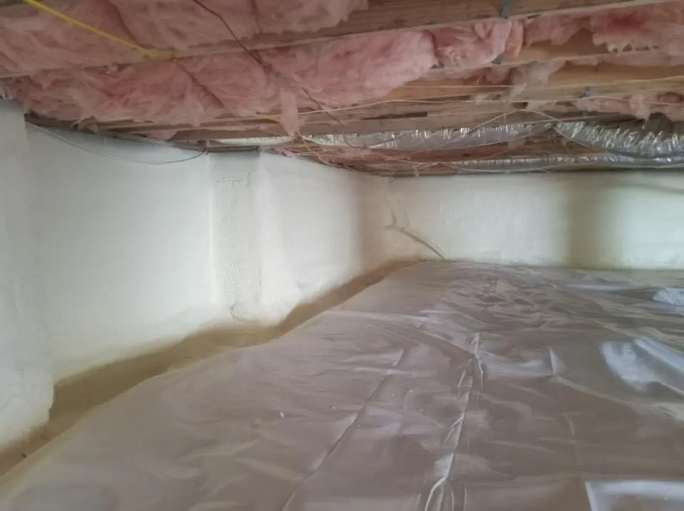 Crawl space encapsulation with closed-cell spray foam for Commercial Roof Restoration in Glassmanor